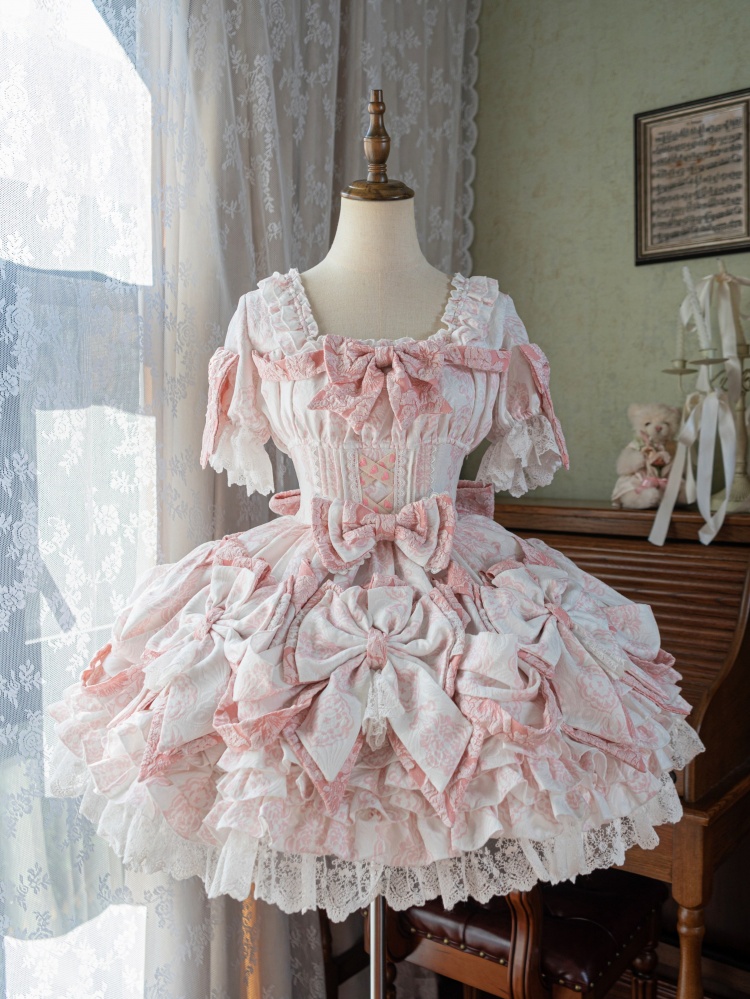 [¥26,877円]ピンクの花嫁姫ロリータゴージャスなちょう結びレイヤードフリルヘムラインワンピース