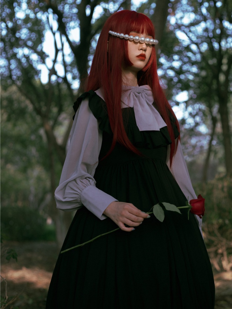 A Beautiful Redhead Cosplayer Girl Wearing a Victorian-style
